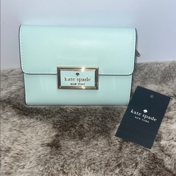 kate spade Handbags - NWT Kate Spade ‘Reagan’ Medium Flap Wallet
